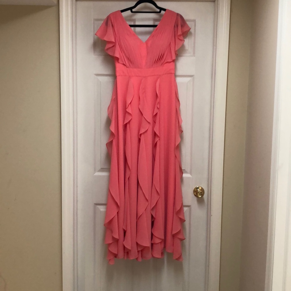 Pretty coral ruffle dress.